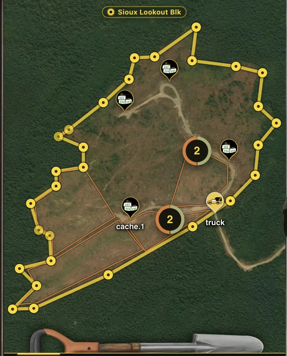 The Sioux Lookout block outlined in gold on satellite imagery, pieces marked out inside it in orange, with tree-box pins, two bag-count markers, a cache and a truck pin